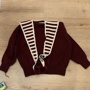 Women’s Maroon Knit Sweater with Cream Pom Scarf